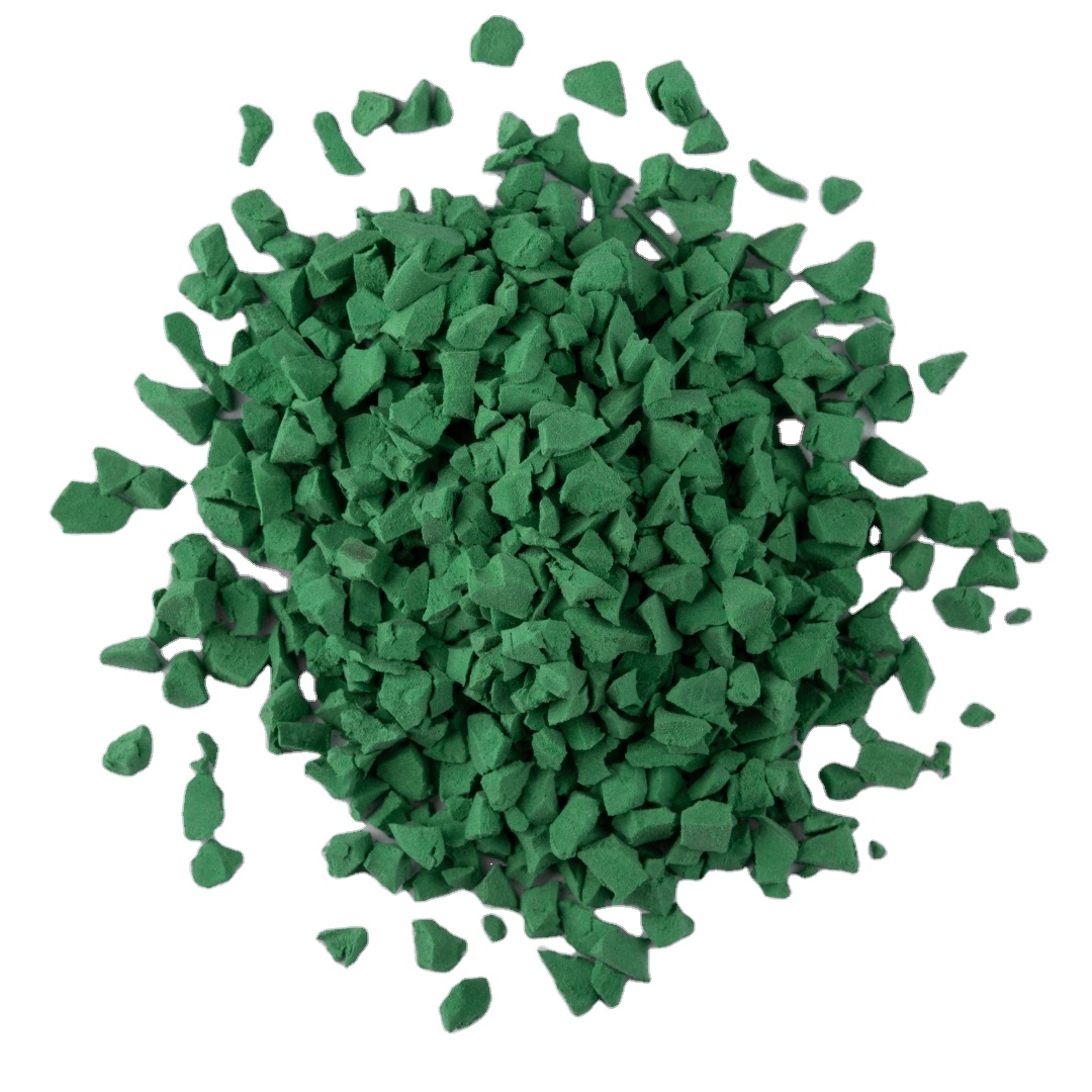 A pile of green EPDM rubber granules on a white background.