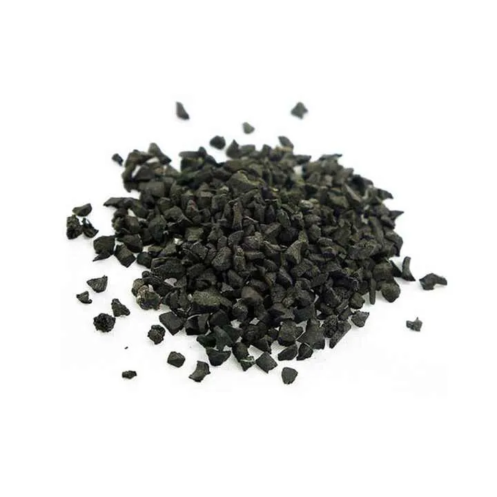 Black SBR rubber granules isolated on a white background, showing the distinct irregular shape of the crumb rubber.