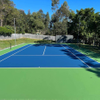 Outdoor blue Silicon PU tennis court, UV-resistant & colorfast, ideal for sunny environments.